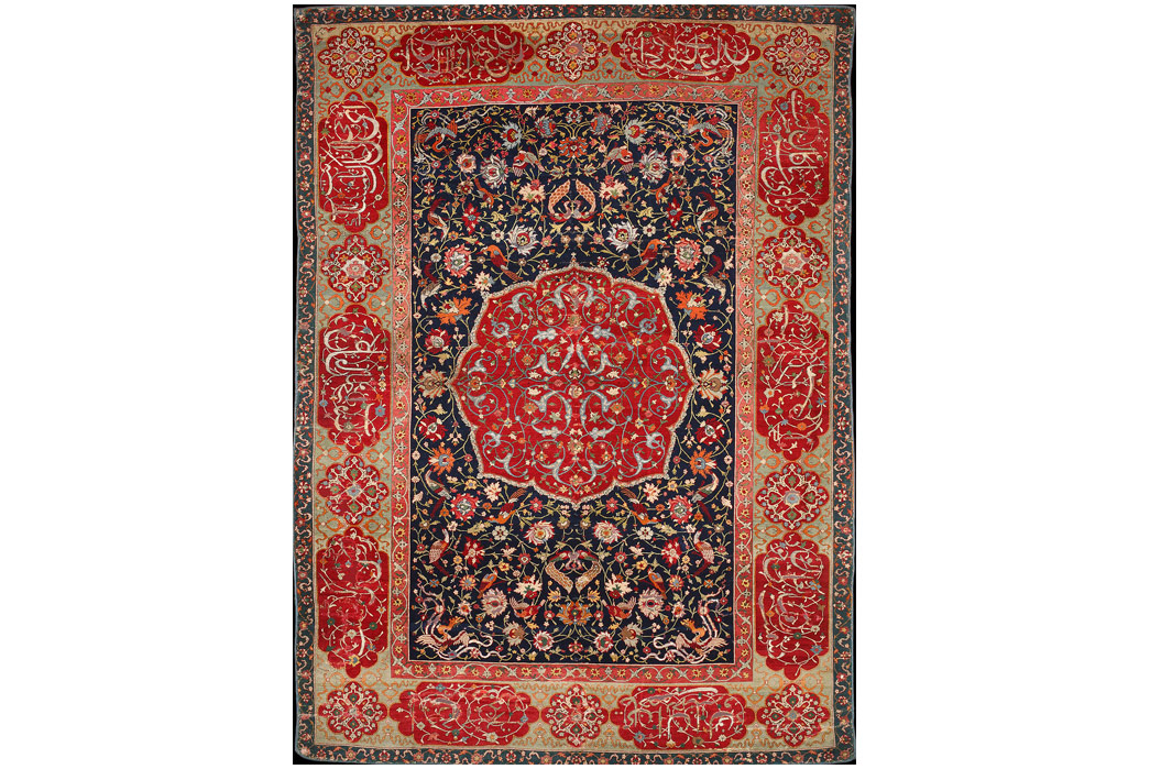 Persian-Rugs---History-&-Buyer's-Guide-A-wool,-silk,-and-metal-thread-rug-from-the-early-Safavid-period,-cira-1600.-Image-via-Wikipedia.