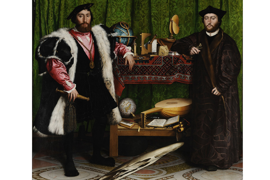 Persian-Rugs---History-&-Buyer's-Guide-The-Ambassadors-by-Hans-Holbein,-painted-in-1533,-depicts-a-persian-rug-in-England.-Image-via-Wikipedia.