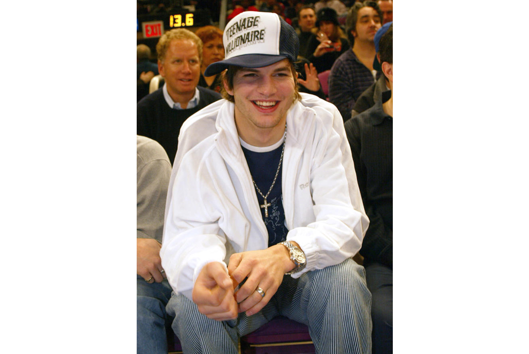 Trucker-Hats-(Title-TBC)-Ashton-Kutcher-wears-a-trucker-hat-at-a-New-York-Knicks-game-in-2003.-Image-via-Getty-Images)