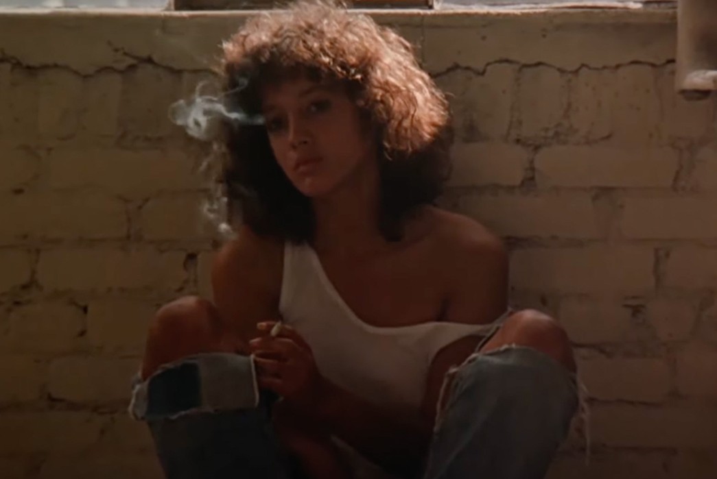 Working-Titles---Flashdance-Alex-in-her-cut-up-jeans-and-a-tank-top.-Image-via-Paramount-Pictures