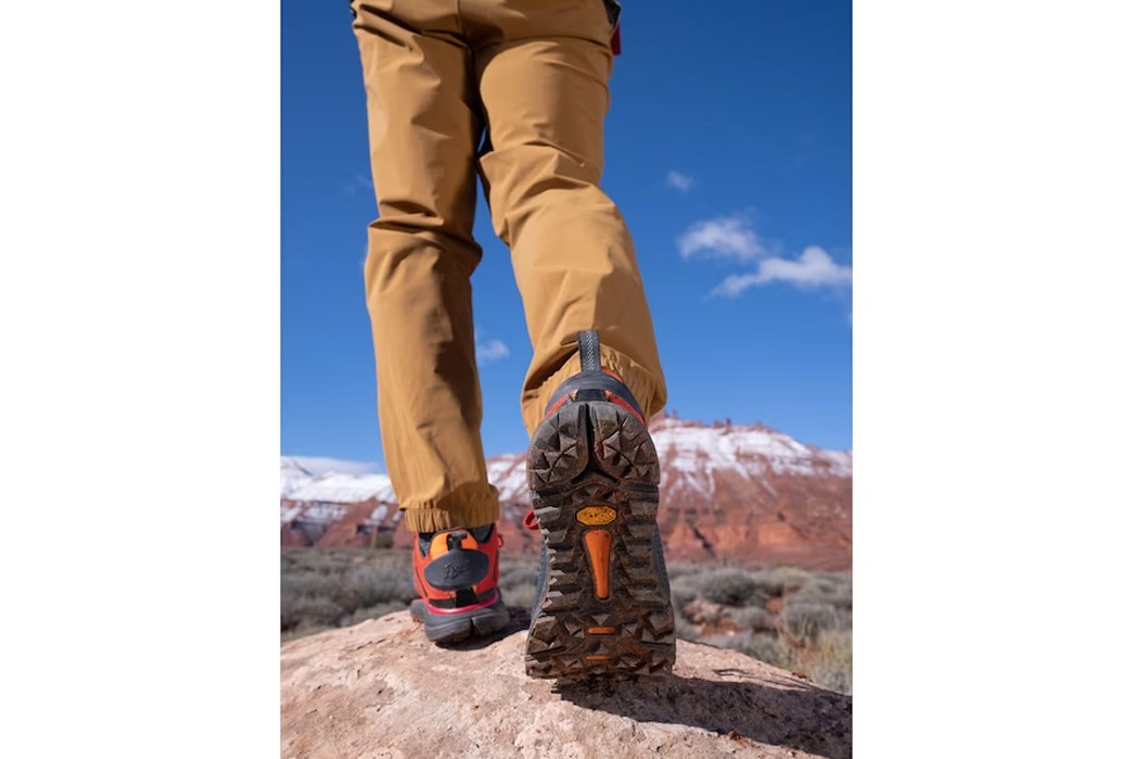 Danner-&-Mystery-Ranch-Team-Up-to-Produce-Trail-2650-GTX-Hiking-Shoe-model-running-on-a-mountain