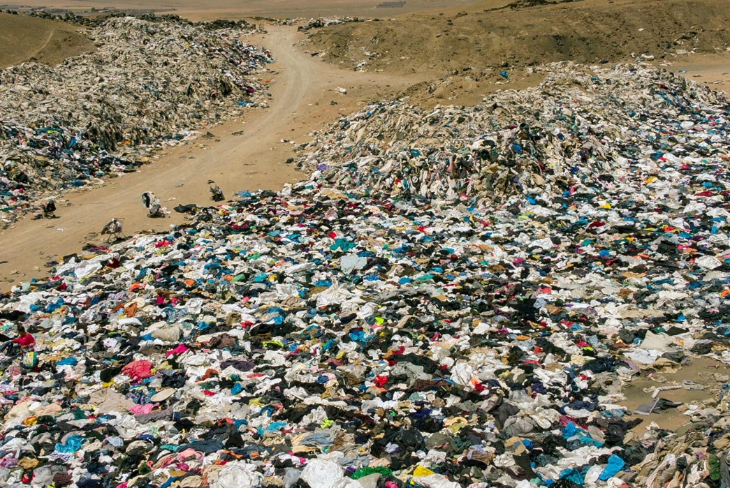 History-&-Evolution-of-the-Graphic-Tee-A-sea-of-discarded-clothing-in-the-Atacama-Desert. -Image-via-Aljazeera.