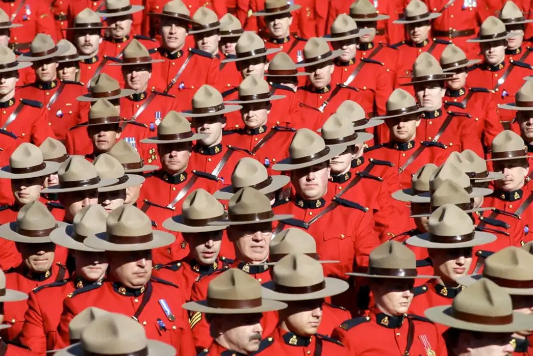 How-to-Get-Into-Camping-Part-3-Garb-and-Grappling-With-Nature-Mounties-iconized-the-campaign-hat-in-Canada.-Image-via-Hat-Guide.