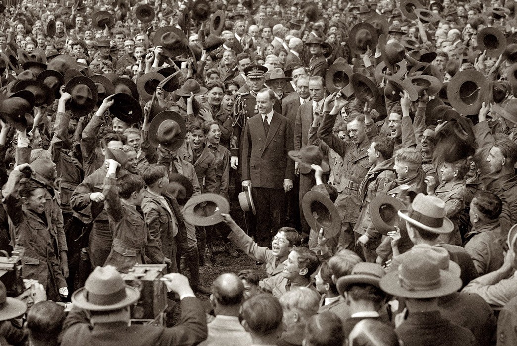 How-to-Get-Into-Camping-Part-3-Garb-and-Grappling-With-Nature-U.S.-President-Calvin-Coolidge-receives-an-ovation-from-some-Boy-Scouts-in-1926.-Image-via-Shorpy.com