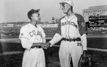 How-Baseball-Influenced-Menswear-Pt.-1-Leroy-Satchel-Paige,-right,-of-the-Kansas-City-Monarchs-and-David-Barnhill-of-the-New-York-Cuban-Stars-before-start-of-game-at-Yankee-Stadium-in-1942-via-MLB.com
