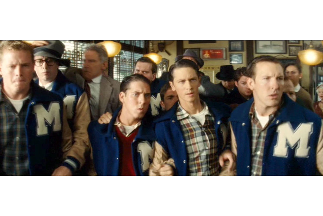 The-History-of-Varsity-Jackets-Some-football-letterman-from-the-fictional-Marshall-College-pictured-before-the-big-diner-brawl-in-Indiana-Jones-and-The-Kingdom-of-the-Crystal-Skull-(2008).