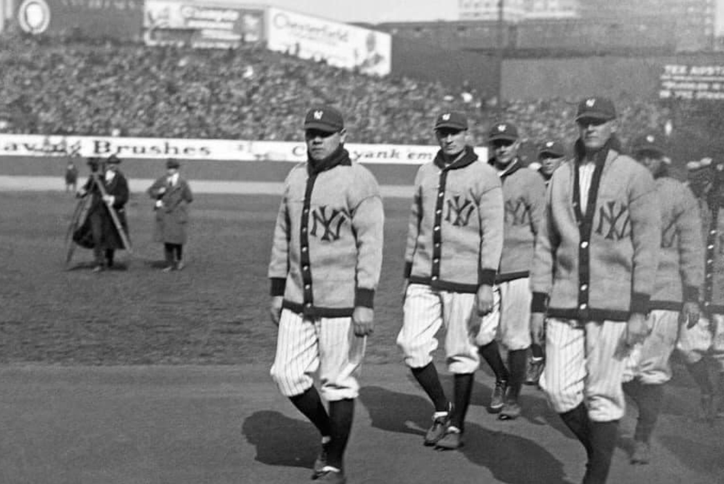 The-History-of-Varsity-Jackets-The-New-York-Yankees-baseball-team-in-their-knit-cardigans,-1923.-Babe-Ruth-is-out-in-front.-Image-via-Sophia-Jerrett-Facebook.