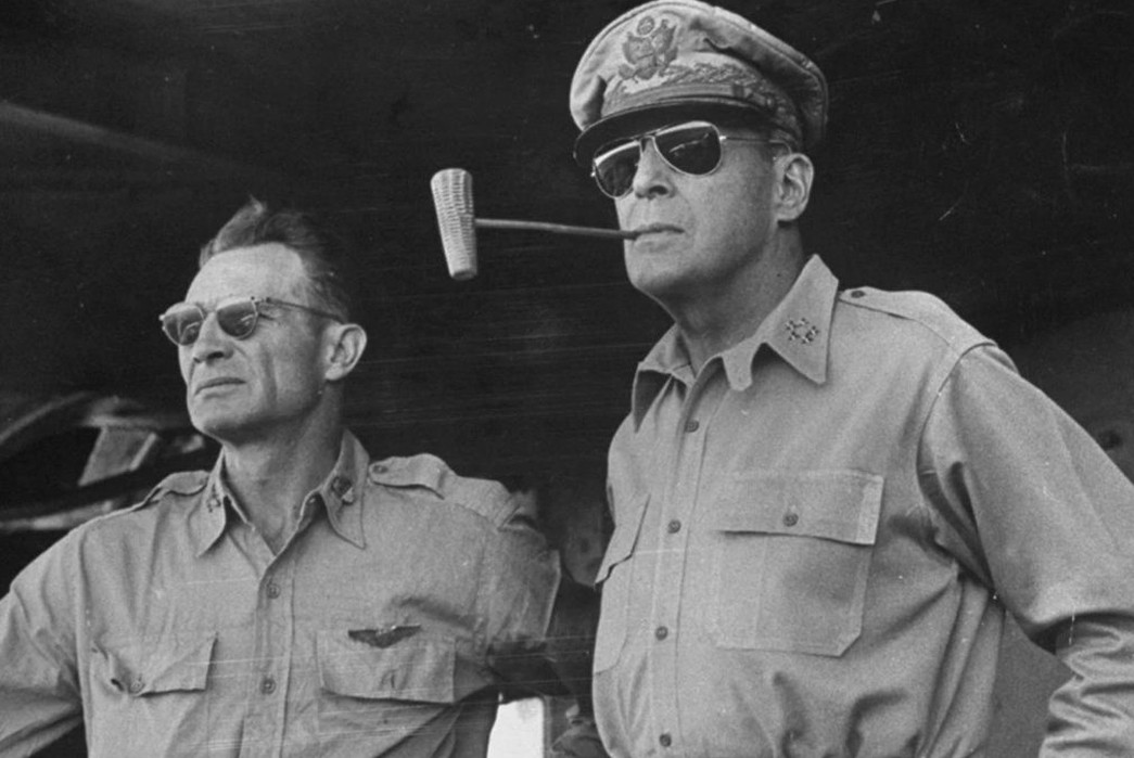 An-In-Depth-History-of-Sunglasses-General-MacArthur-and-another-officer-wearing-sunglasses-during-WWII.-Image-via-BBC.