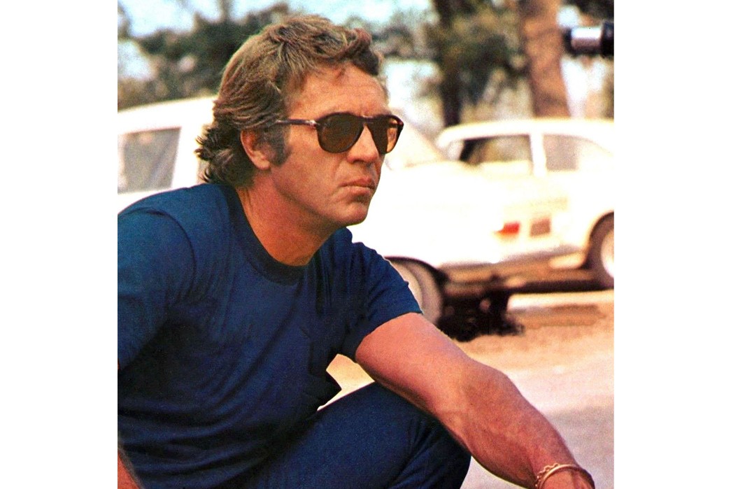 An-In-Depth-History-of-Sunglasses-Steve-McQueen-in-Persol-714-shades-that-are-still-available-today.-Image-via-Bulang-&-Sons.