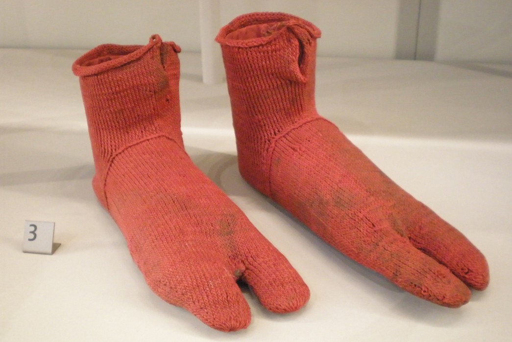 The-History-&-Development-of-Socks-'The-earliest-known-pair-of-socks,-created-by-nalbinding.-Dating-from-300–500,-these-were-excavated-from-Oxyrhynchus-on-the-Nile-in-Egypt.