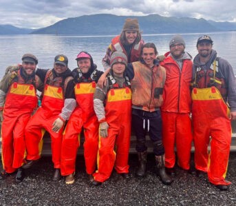 Alaskan-Odyssey-Fishing-Fleet-Workwear,-Part-I-Grant-Hanson-(far-left)-and-some-of-the-crew-on-Harvester-Island,-Alaska.-Image-via-Grant-Hanson.