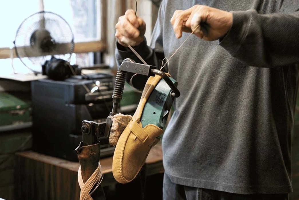 The-Maine-Attraction-All-About-Leather-Footwear-Being-Made-in-Maine-Hand-assembling-a-pair-of-Easymocs-in-Maine.-Image-via-Easymoc.