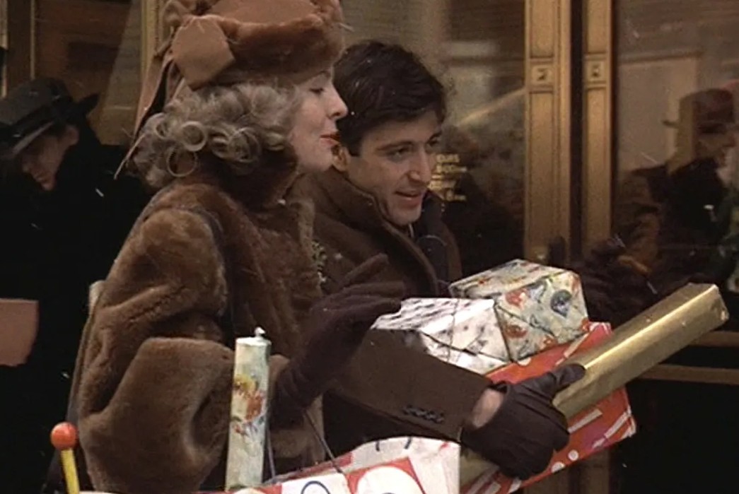 Five-Finger-Fit-The-History-of-Gloves-A -Christmas-shopping-scene-in-The-Godfather-(1972).-Michael-Corleone-(Al-Pacino)-sports-a-pair-of-brown-leather-gloves.-Image-via-BAMF-Style.