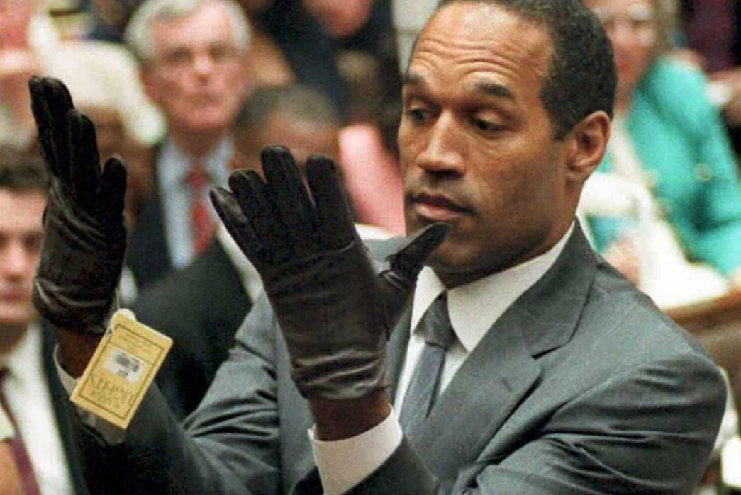 Five-Finger-Fit-The-History-of-Gloves-Simpson-examining-the-ill-fitting-gloves.-Image-via-Los-Angeles-Times.